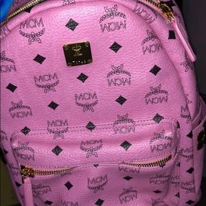 pink or brown MCM medium backpack